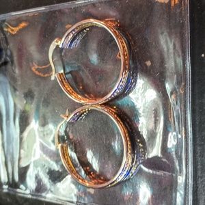 Sterling silver with gold accent hoop earrings
